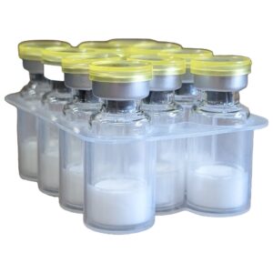 10 research peptide vials with yellow caps containing lyophilized powder